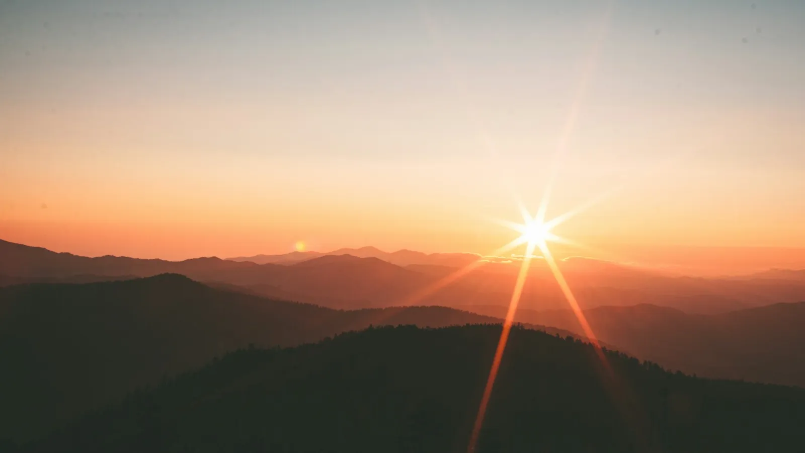 Dark mountain horizon at first light